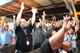 Employees following along with stretches during the Wellness Break at the all-employee meeting